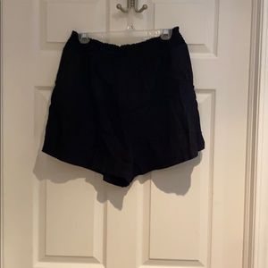 High-waisted black linen shorts